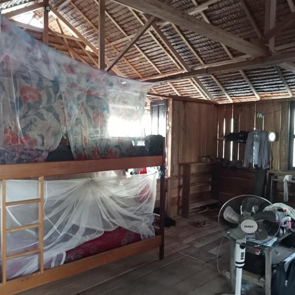 Male volunteers beach bungalow